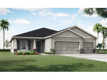 Two-story house with a two-car garage and a landscaped front yard at 549 Silver Course Radl, Ocala, FL 34472