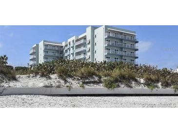 Beachfront building with multiple levels and ocean views at 611 S Atlantic Ave # 4612, New Smyrna Beach, FL 32169