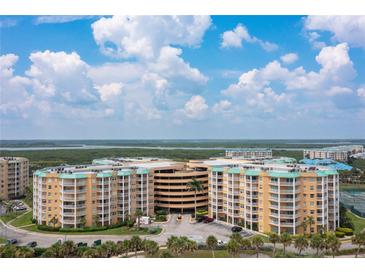 Luxury condo building with parking garage and ocean views at 4650 Links Village Dr # D-501, Ponce Inlet, FL 32127