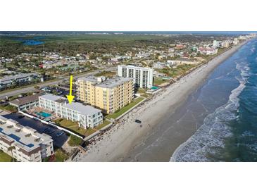 Aerial view of beachfront property, highlighting building location at 3509 S Atlantic Ave # 209, New Smyrna Beach, FL 32169