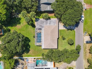 Aerial view showing house, pool, and large backyard at 813 E 13Th Ave, New Smyrna Beach, FL 32169
