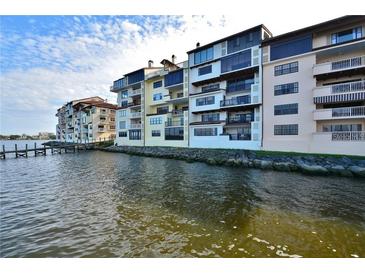 Multi-story condo building with waterfront access and a dock at 731 Marina Point Dr # 7310, Daytona Beach, FL 32114