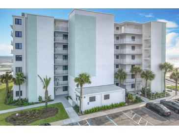 Oceanfront building with balconies and parking at 5303 S Atlantic Ave # 270, New Smyrna Beach, FL 32169