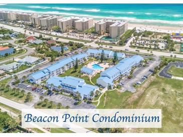 Aerial view of Beacon Point Condominium complex and beach at 4590 S Atlantic Ave # 263, Ponce Inlet, FL 32127