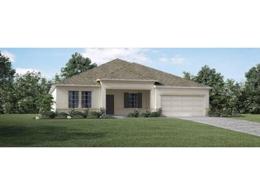 One-story home with a light beige exterior and landscaping at 2231 Elegant Manor Cir, Edgewater, FL 32141