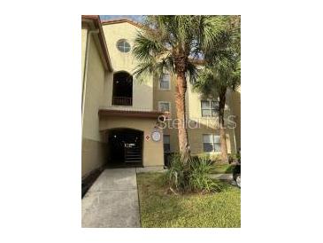 Condo building with landscaping and parking at 824 Camargo Way # 106, Altamonte Springs, FL 32714