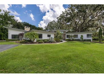 Photo one of 12550 Lakeshore Dr Clermont FL 34711 | MLS O6142079