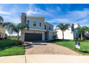 Photo one of 909 Ocean Course Ave Davenport FL 33896 | MLS O6188764