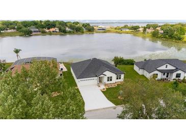 Lakefront property with backyard at 10625 Summit Lakes Ln, Clermont, FL 34711