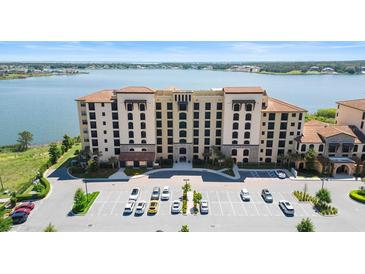 Lakefront condo building with ample parking at 16300 County Road 455 # 103, Montverde, FL 34756