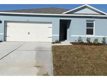 Photo one of 332 E Boardwalk Ave Haines City FL 33844 | MLS O6195926