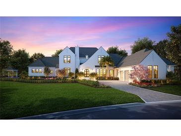 Stunning two-story home with a grand facade and driveway at 11059 Cromwell Rd, Orlando, FL 32827
