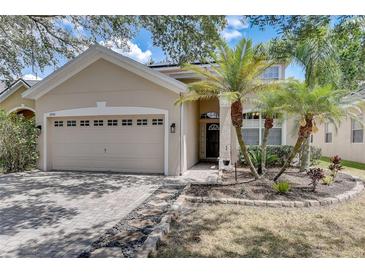 Beautiful home with two-car garage and nicely landscaped yard at 2938 Daybreak Dr, Orlando, FL 32825