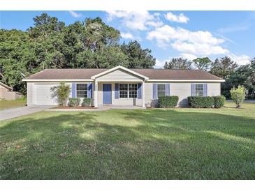 Charming single story home with blue shutters at 2805 Nw 4Th Ave, Ocala, FL 34475