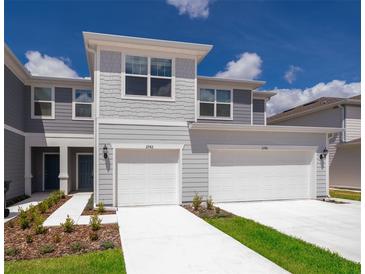 Two-story townhome with two-car garage at 2742 Fetching Trl, Davenport, FL 33896