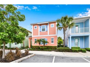 Two-story house with a unique exterior design and ample parking at 2984 Salted Rim Rd, Kissimmee, FL 34747