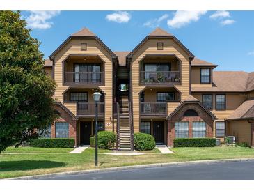 Two story townhome building with landscaping and parking at 320 Black Oak Ct # 107, Altamonte Springs, FL 32701
