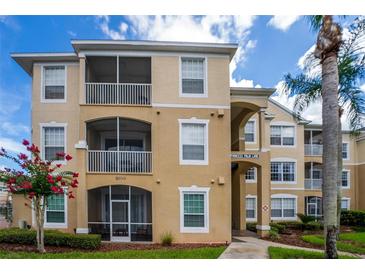 Building exterior showcasing residential units at 8100 Princess Palm Ln # 201, Kissimmee, FL 34747