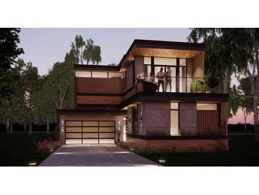 Modern two-story home with a sleek design, balcony, and attached garage at 627 Country Club Dr, Winter Park, FL 32789