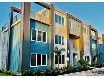 Modern three-story building with contemporary design at 7740 Sandy Ridge Dr # 234, Reunion, FL 34747