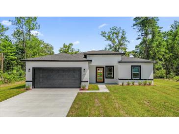 Photo one of 14711 Sw 43Th Terrace Rd Ocala FL 34473 | MLS O6220137