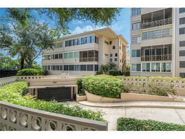 Attractive building exterior with gated parking at 311 E Morse Blvd # 7-2, Winter Park, FL 32789