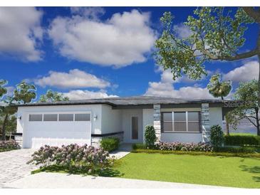 Single-story home with attached garage at 4963 Pall Mall E St, Kissimmee, FL 34758