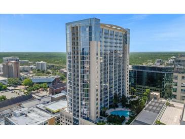 High-rise building with a rooftop pool and city views at 155 S Court Ave # 2208, Orlando, FL 32801