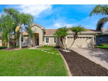 Single-Gathering home with two-car garage and landscaping at 3404 Great Pond Dr, Kissimmee, FL 34746