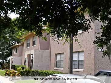 Two-story building with gated entrance and parking at 1181 Paseo Del Mar # D, Casselberry, FL 32707