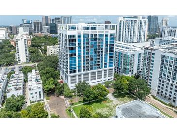 Aerial view of a modern building in a city setting at 260 S Osceola Ave # 907, Orlando, FL 32801