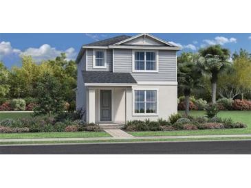 Two-story Craftsman style home with gray siding and landscaping at 2516 Cedar Rose St, Apopka, FL 32712