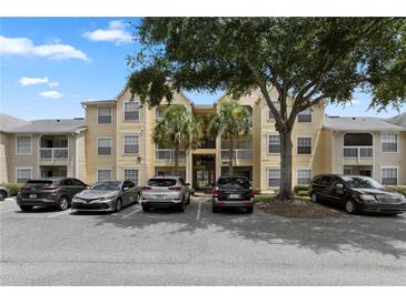 Apartment building with parking and landscaping at 1069 S Hiawassee Rd # 1336, Orlando, FL 32835