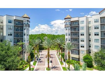 Luxury condo community with resort-style amenities and lush landscaping at 14501 Grove Resort Ave # 3132, Winter Garden, FL 34787