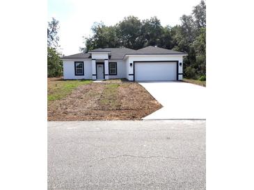 Photo one of 12793 Sw 43Rd Cir Ocala FL 34473 | MLS O6236587