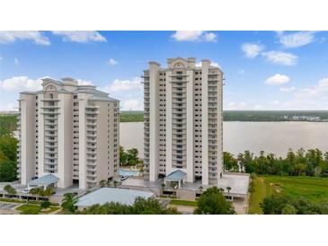Two-story condo building with lake view at 13427 Blue Heron Beach Dr # 1004, Orlando, FL 32821