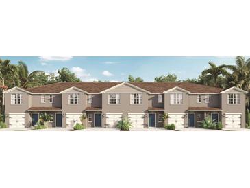 Modern townhome style house with attached garage at 553 Zinfandel Dr, Holly Hill, FL 32117