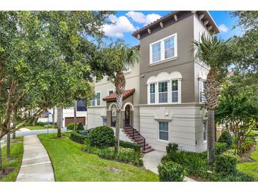 Three-story townhome with Mediterranean style at 801 Lobelia Dr, Lake Mary, FL 32746