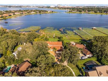 Luxury home nestled on a large lot with stunning lake views at 8605 Bay Shore Cv, Orlando, FL 32836