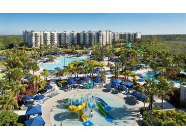 Aerial view of resort-style pool and water features at 14501 Grove Resort Ave # 1219, Winter Garden, FL 34787