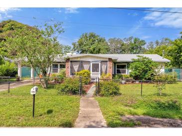 Charming single story home with brick facade and well-maintained lawn at 132 N Hastings St, Orlando, FL 32835