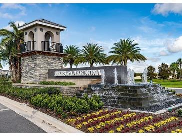 Impressive entrance to Isles of Lake Nona with fountain and signage at 14315 Sapelo Beach Dr, Orlando, FL 32827