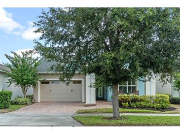 Single-Gathering home with two-car garage and landscaped yard at 4907 W Fountainwood Dr, St Cloud, FL 34772