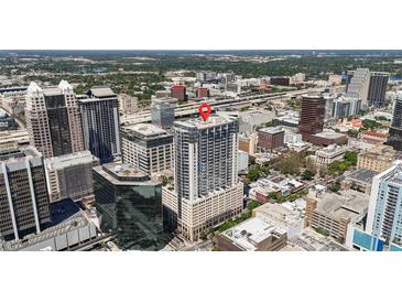 High-rise building in a city, offering stunning cityscape views at 155 S Court Ave # 2710, Orlando, FL 32801