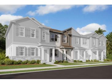 Modern townhome community with attractive exteriors at 15871 Tollington Aly, Winter Garden, FL 34787
