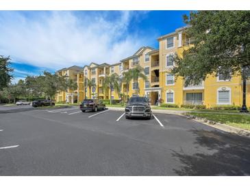 Exterior view of a three-story apartment building at 4814 Cayview Ave # 21013, Orlando, FL 32819