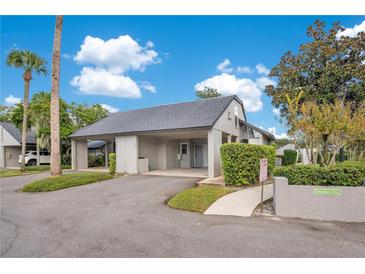 Single-story home with carport and walkway at 899 Jonathan Way # 899, Altamonte Springs, FL 32701