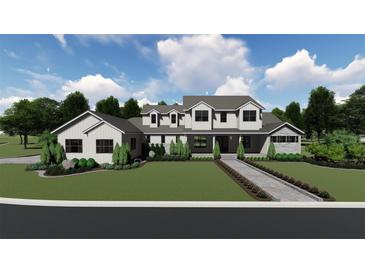 Modern farmhouse exterior with landscaping at 405 Long And Winding Rd, Howey In The Hills, FL 34737