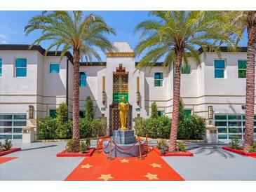 Hollywood-themed building exterior with palm trees at 1021 Fantasy Dr, Davenport, FL 33896