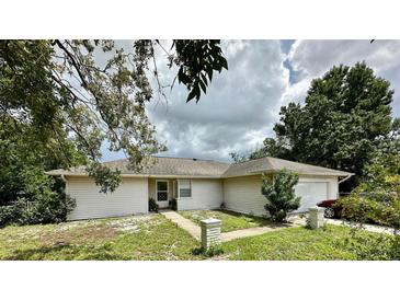 A charming single-story home with a two-car garage at 1501 Fort Smith Blvd, Deltona, FL 32725